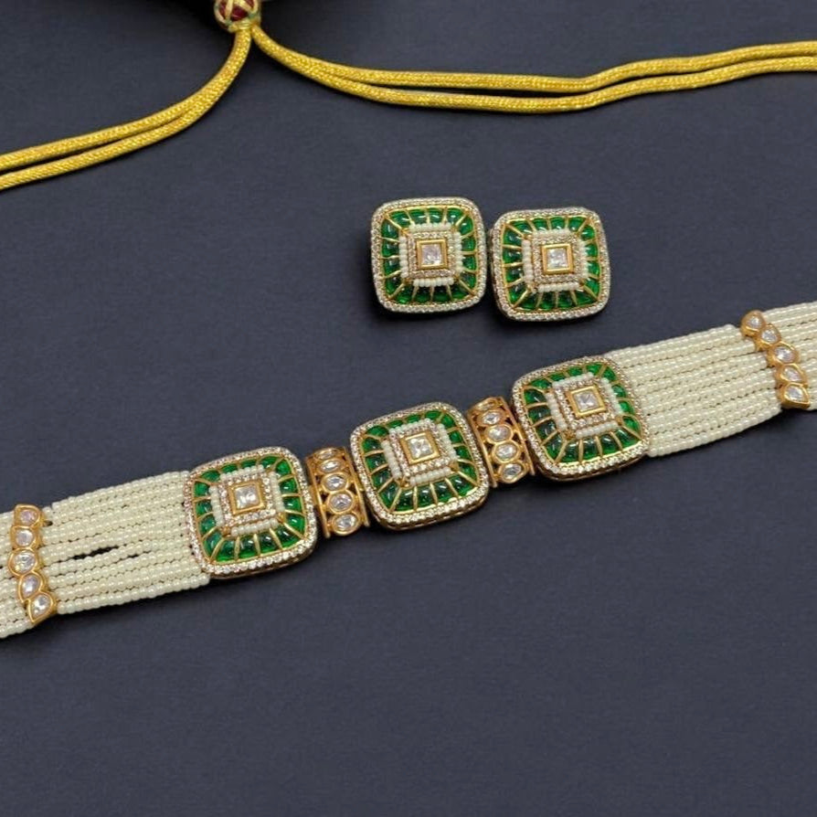 Rear view of choker showing clasp detail and smooth gold enamel finish